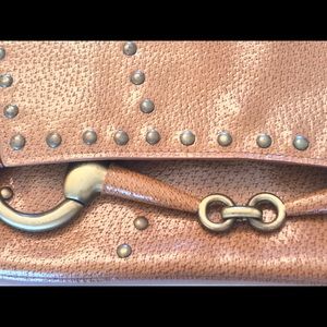 Brown leather horse bit purse